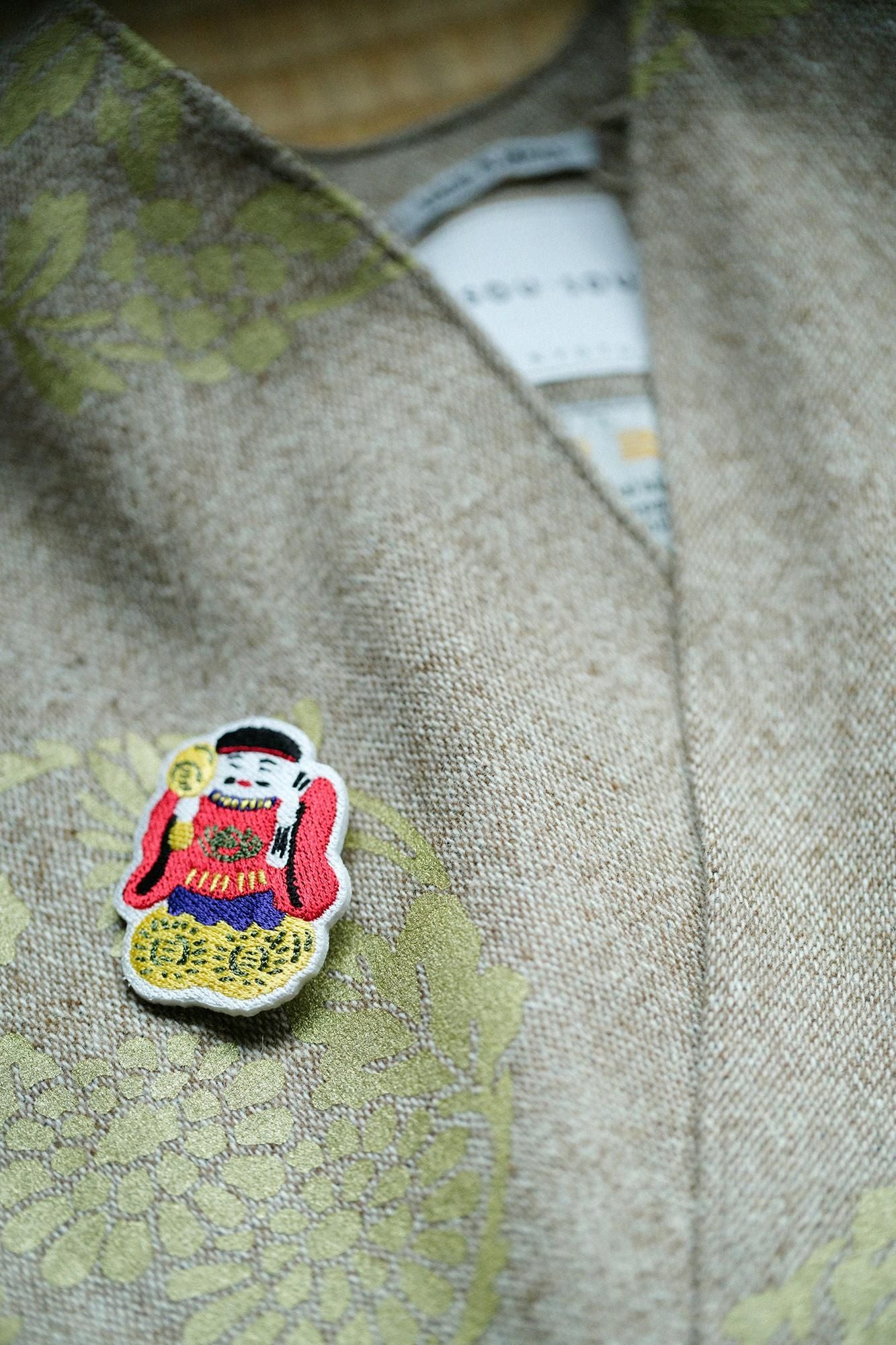 刺繍飾り（ししゅうかざり）／土人形（つちにんぎょう） 大黒（だいこく）さん